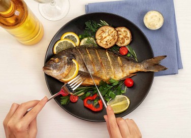 Sognare di mangiare pesce