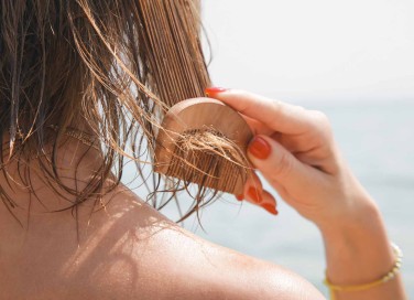 Come prendersi cura dei capelli in estate