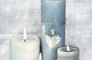 Candele con fiocchi di neve